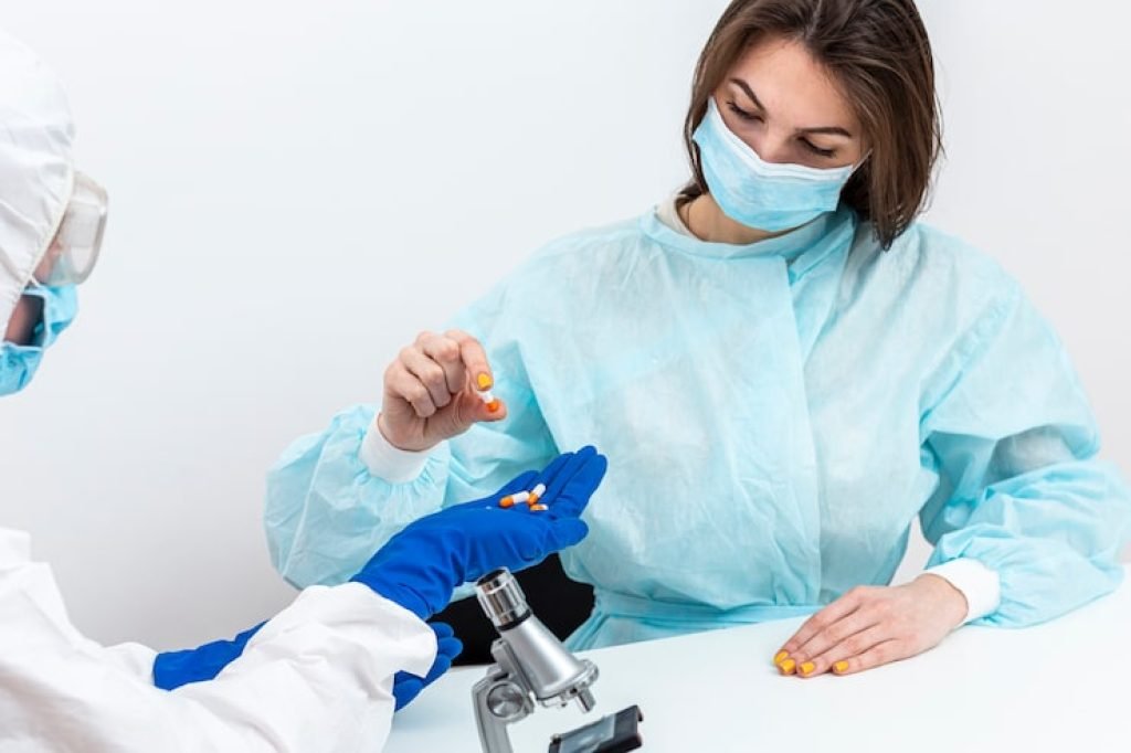 person-hazmat-suit-with-pacient_23-2148483212